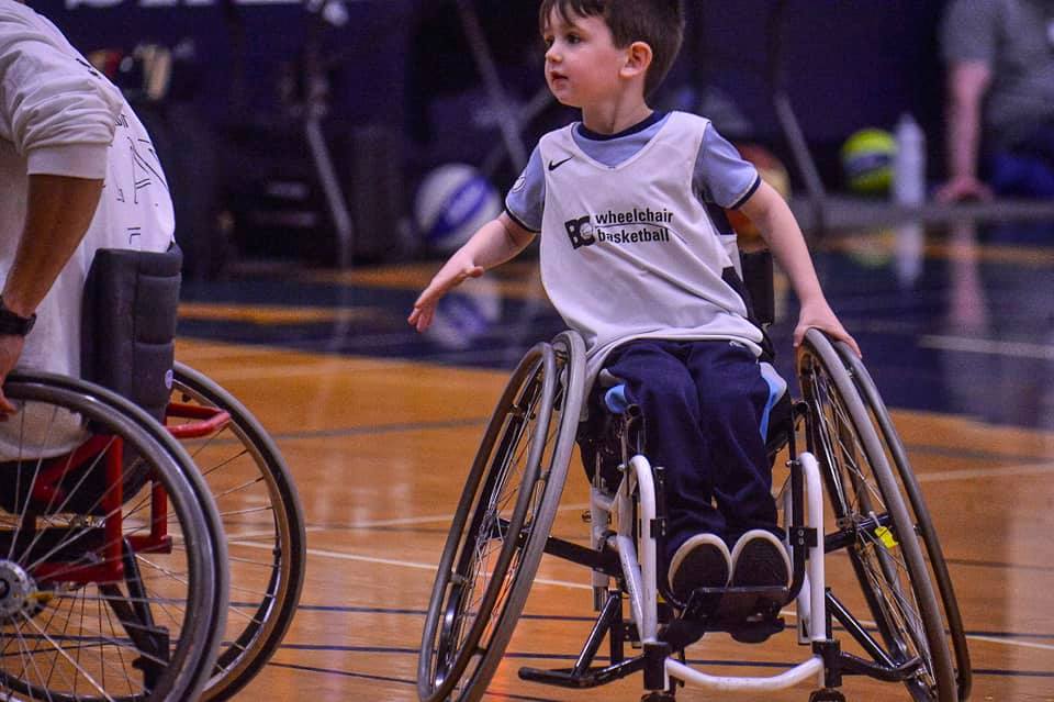 Brody playing basketball